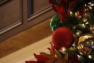 Close-up of elegant Christmas card decorations featuring glittery snowflakes and festive ribbons.