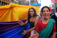 A vibrant lifestyle shot of people enjoying their day in stylish outfits.