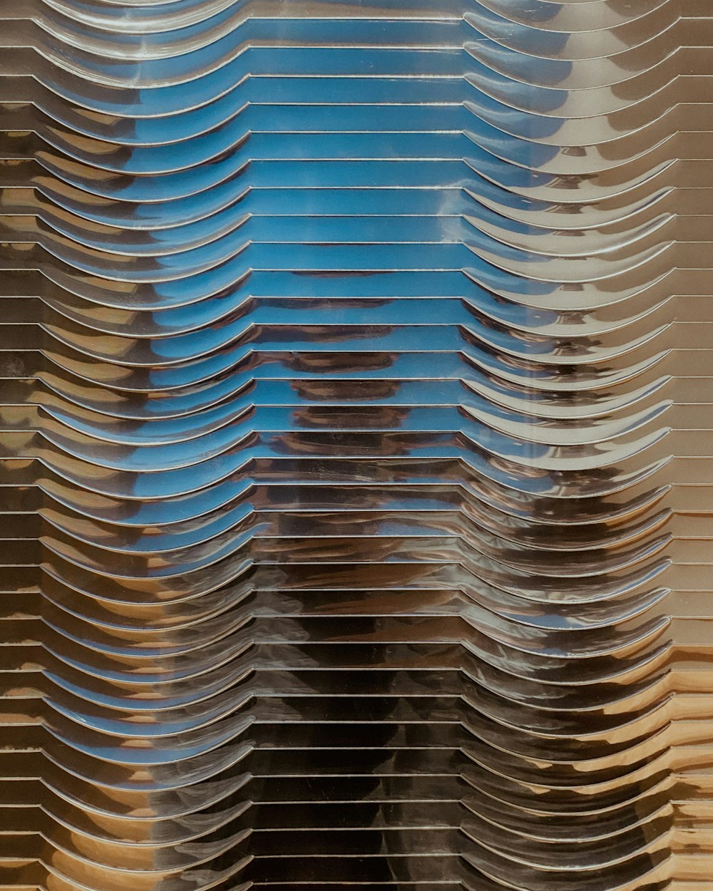 a large stack of plates sitting on top of a table