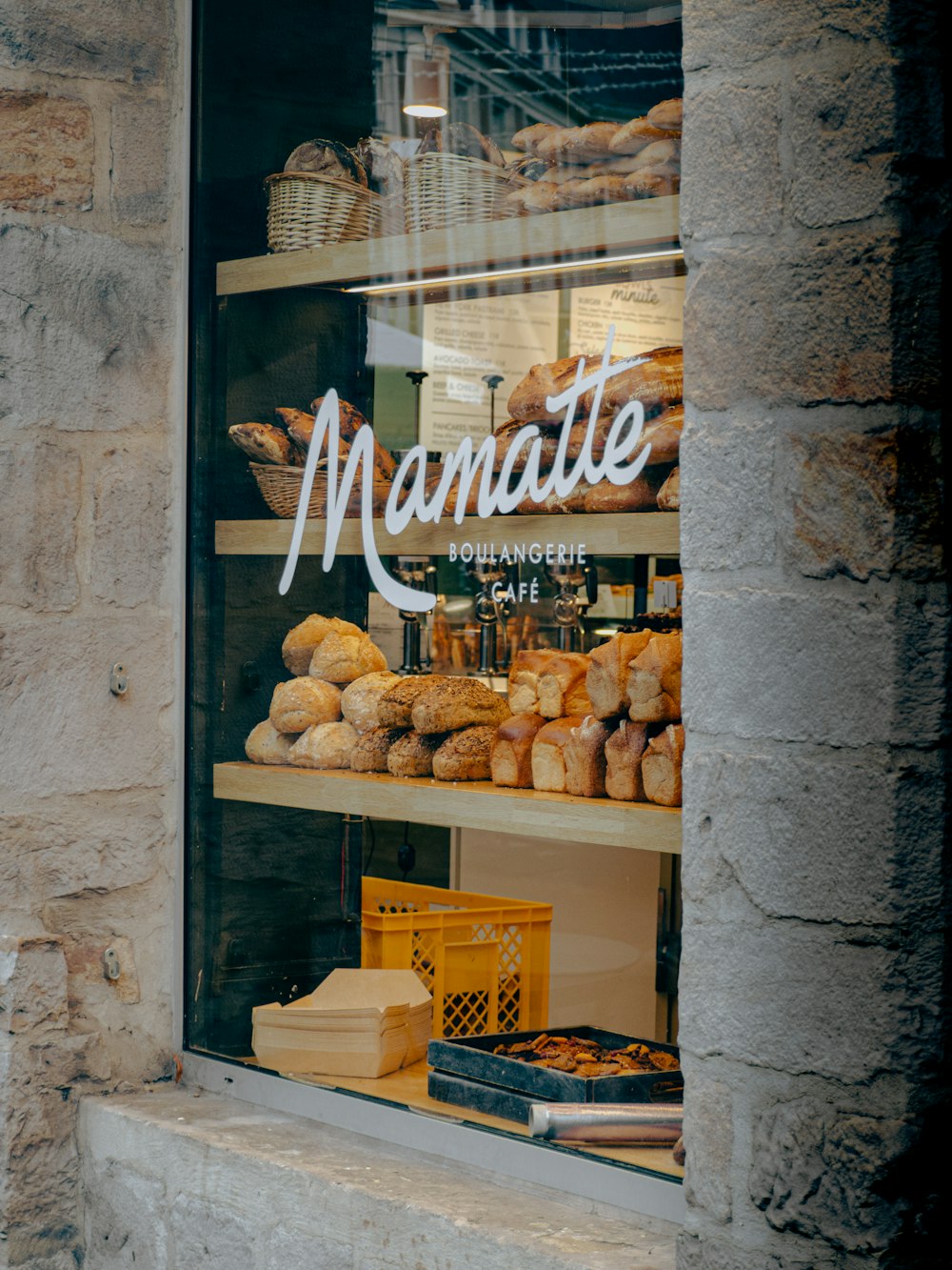 a store window with a display of pastries