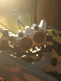 Detailed shot of a polished brake disc being measured with precision tools.