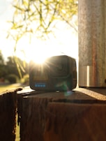 A candid moment capturing the joy of unboxing new lifestyle gear with natural daylight streaming in.