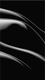 Sleek black and silver abstract background with subtle tech-inspired lines.