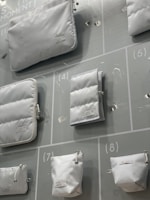 Various sizes of shrink bags neatly displayed on a shelf.