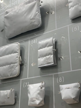 A vibrant assortment of storage bags in various sizes neatly arranged on shelves.