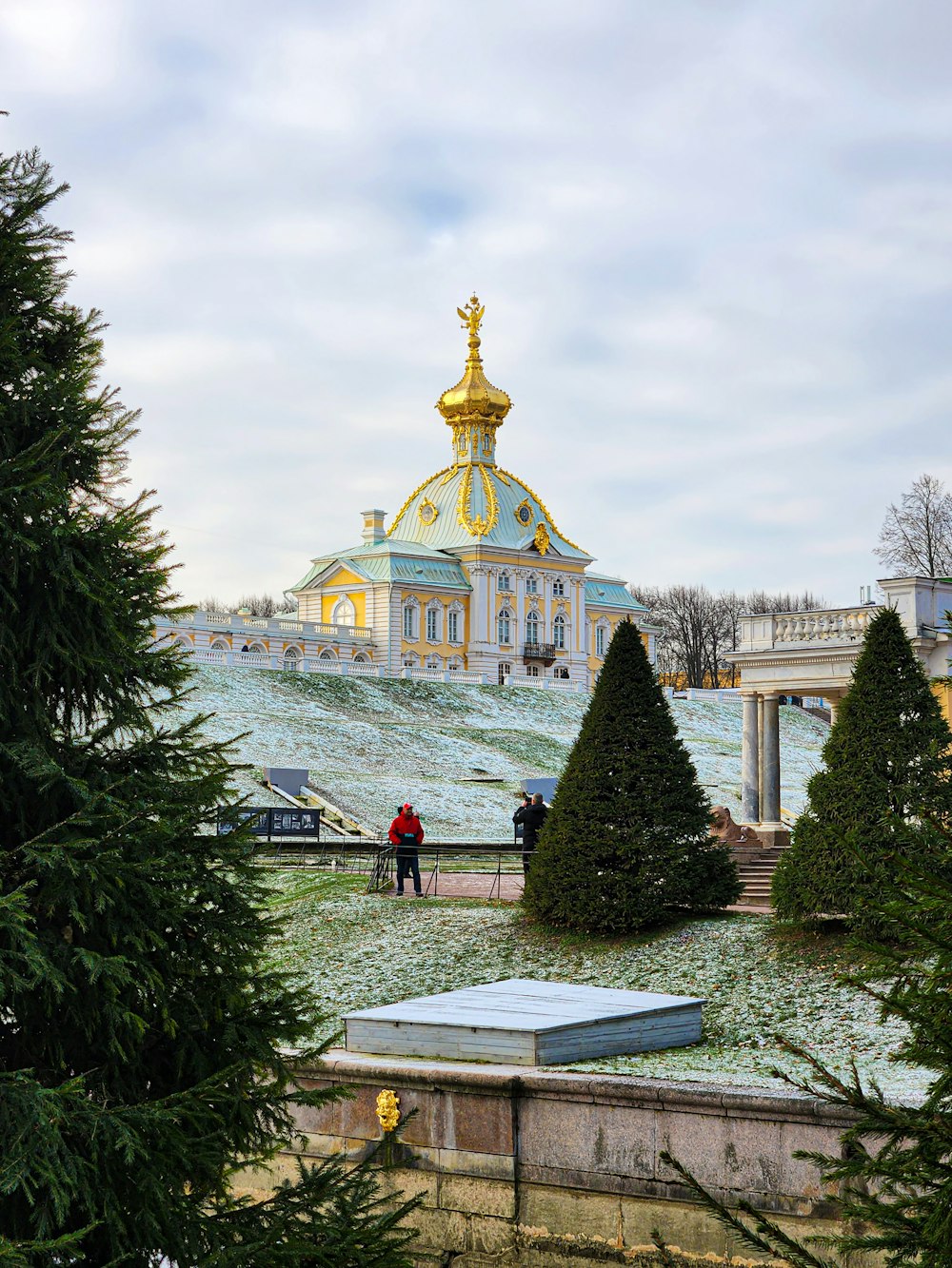 a large building with a golden dome on top of it