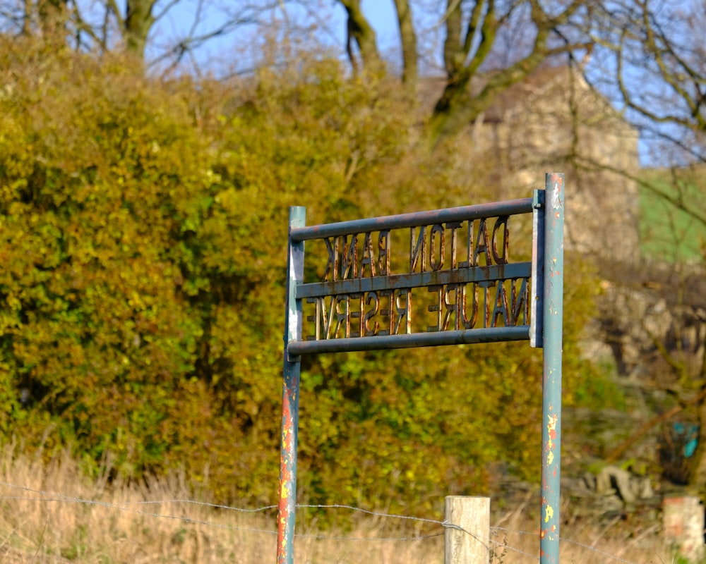 a sign that is on the side of a road