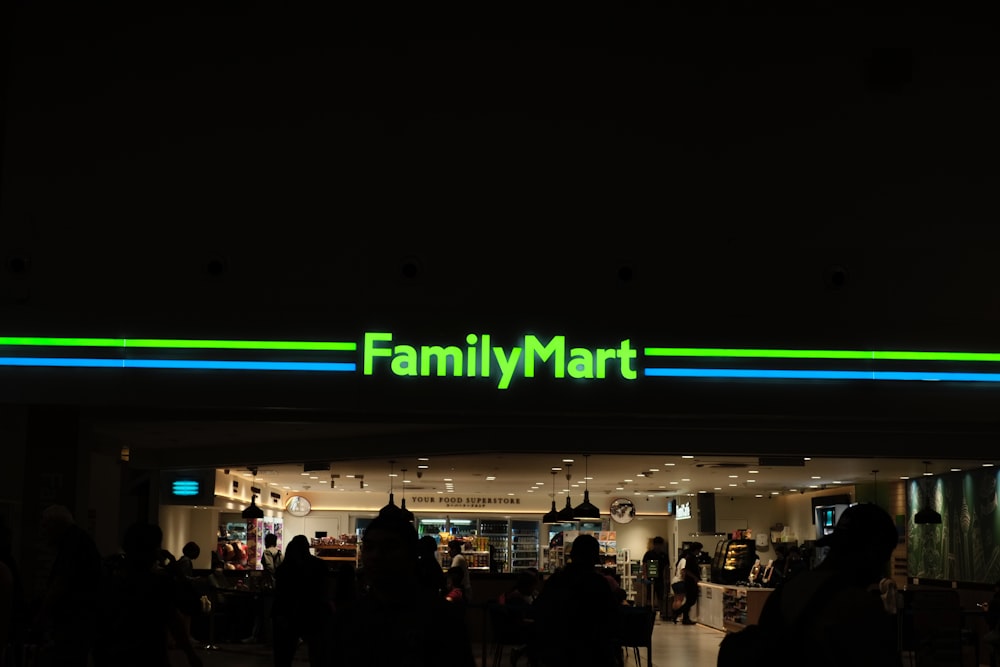 a group of people standing in front of a store