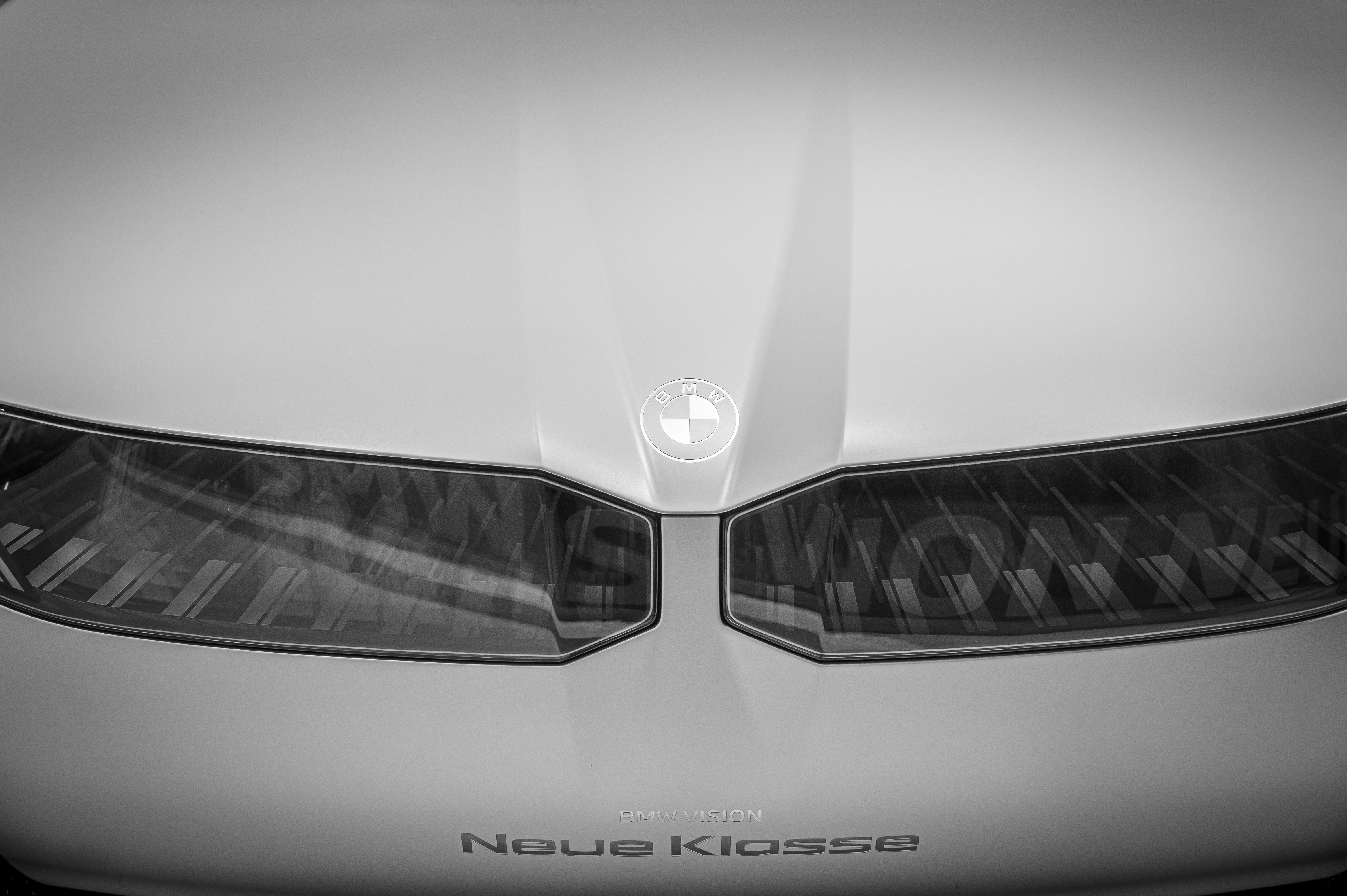 a close up of the headlights of a sports car