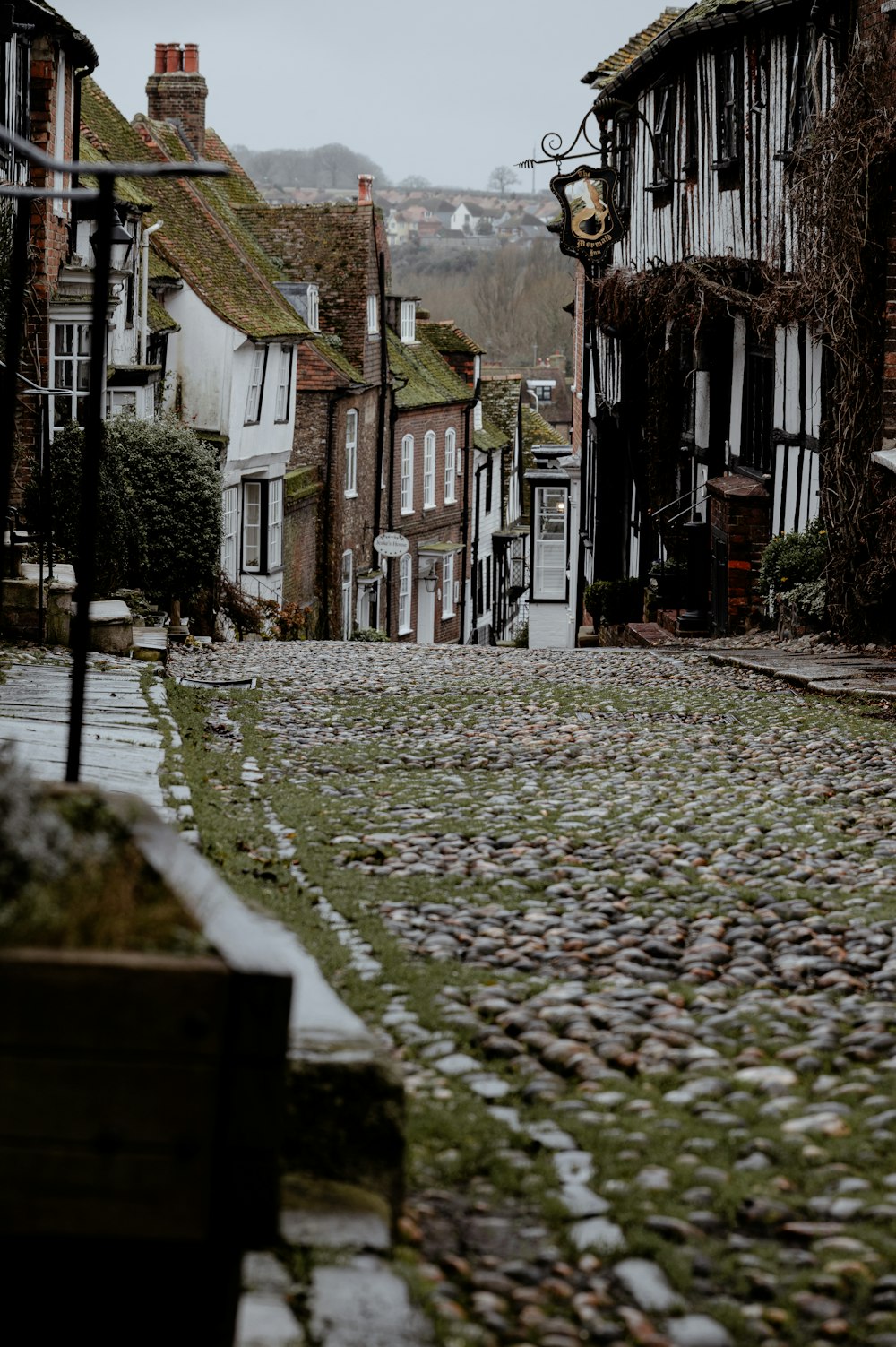 a cobblestone street in a small village