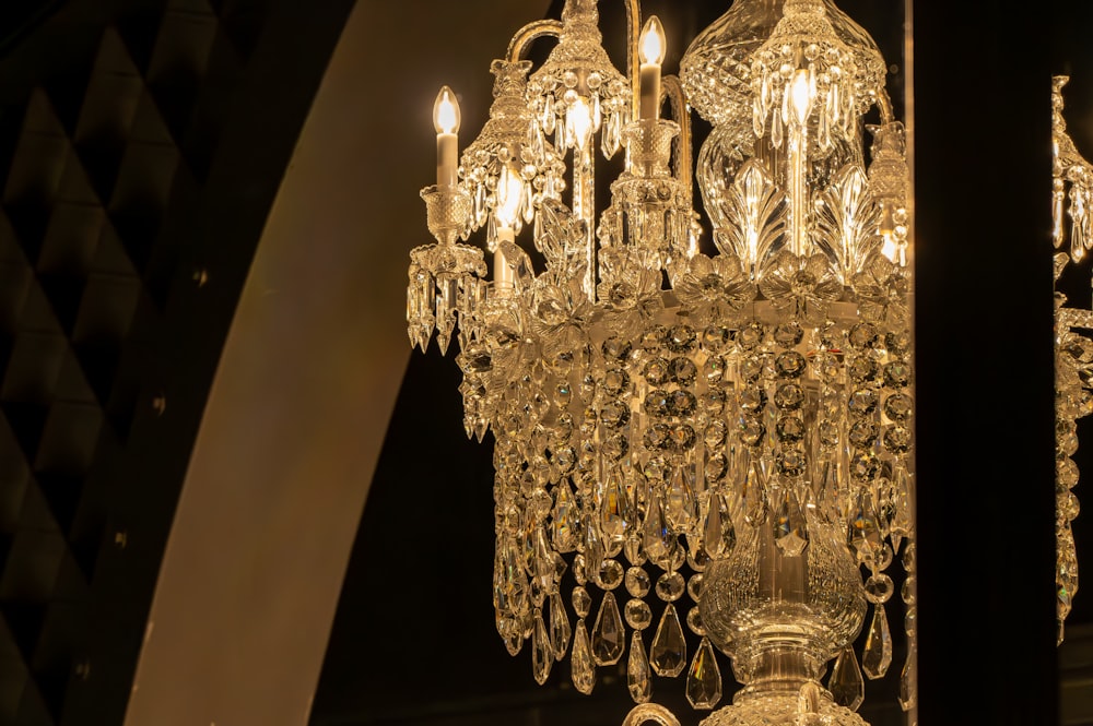 a chandelier hanging from a ceiling in a room