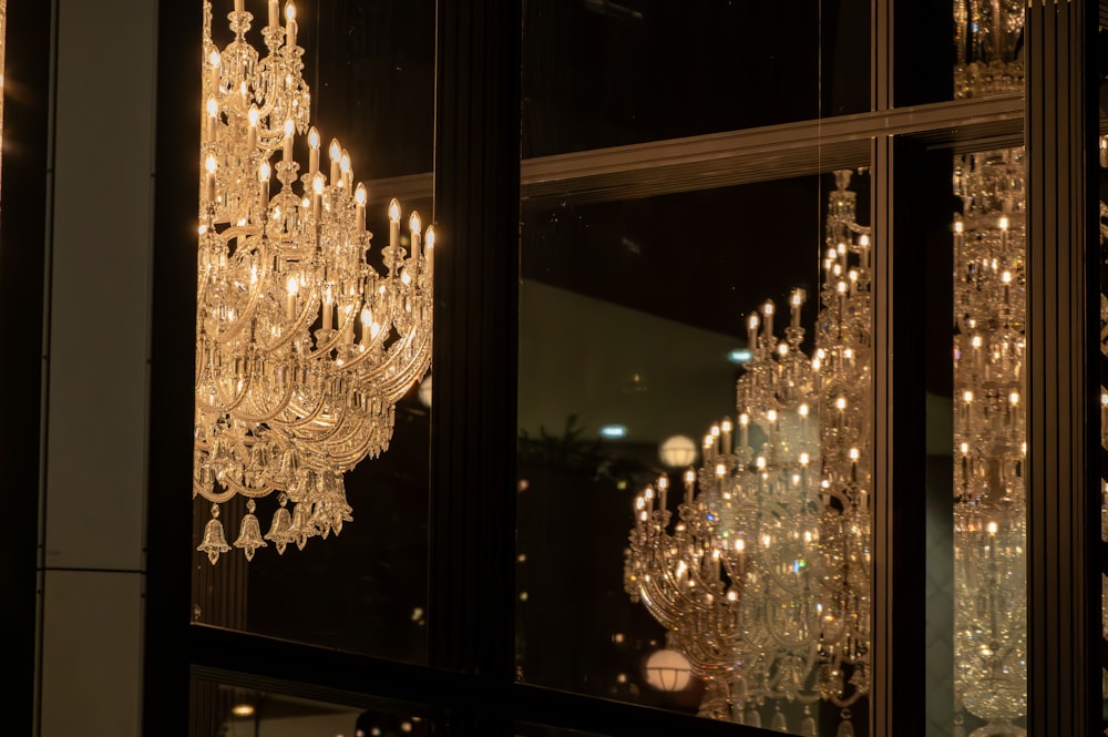 a chandelier hanging from the side of a building