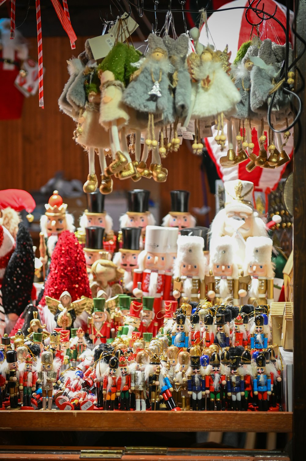 a bunch of christmas ornaments are on display
