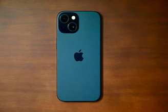Close-up of a sleek apple iPhone 15 Pro Max case with a matte finish on a wooden table