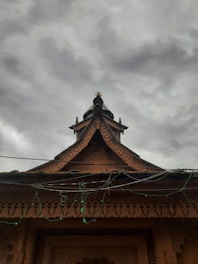a tall building with a clock on the top of it