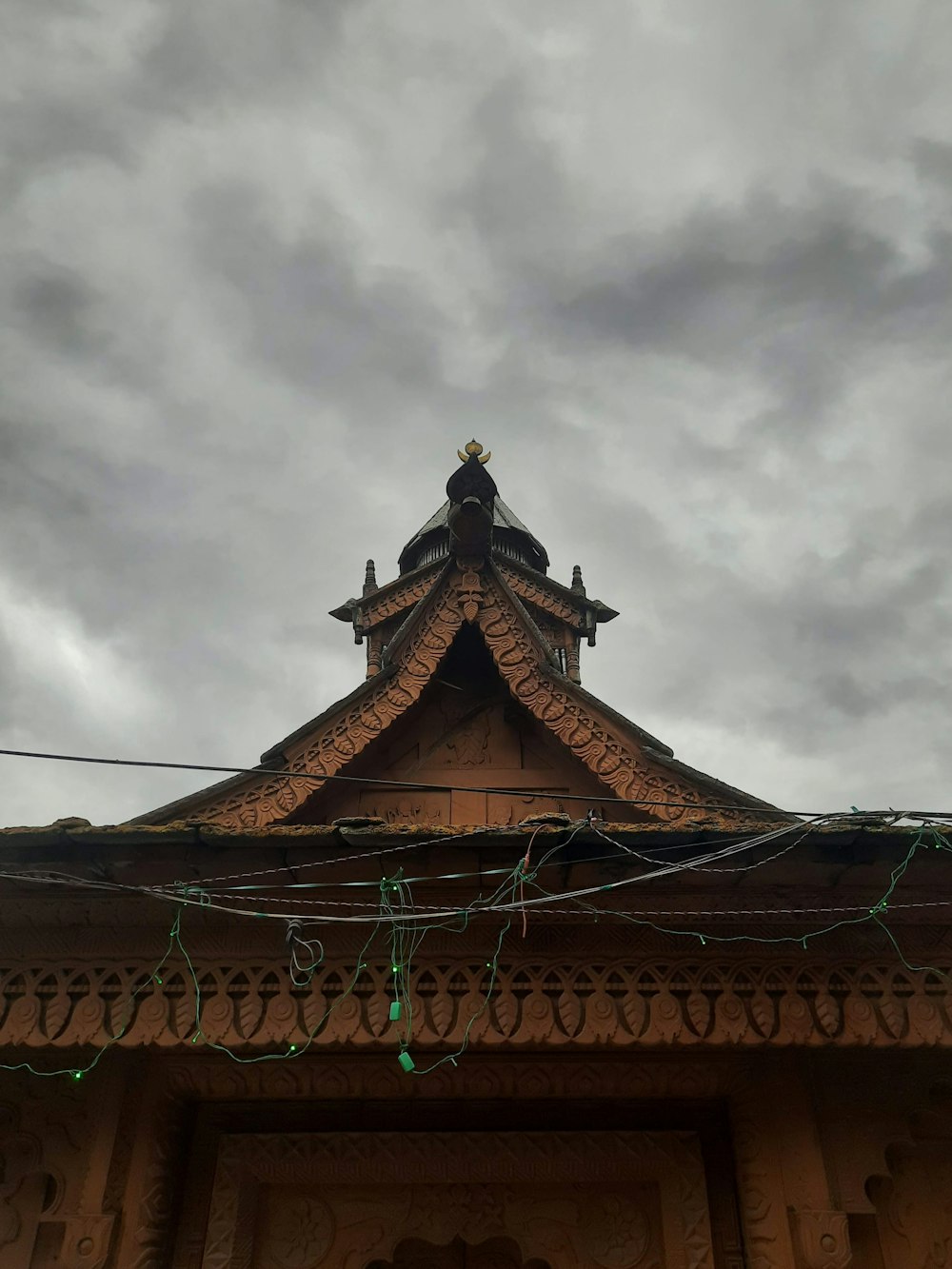 a tall building with a clock on the top of it