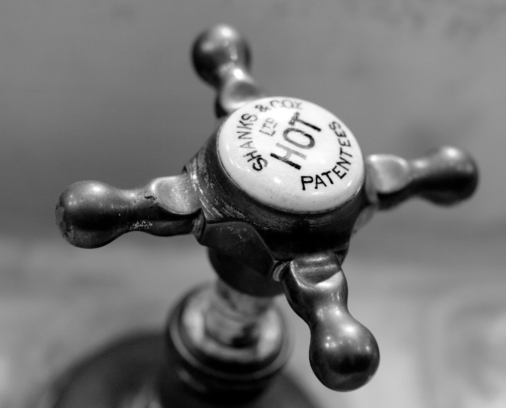 a close up of a bottle stopper on a table