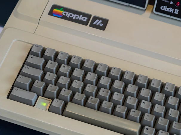 A classic 90s computer keyboard with yellowed keys, symbolizing early digital nostalgia.