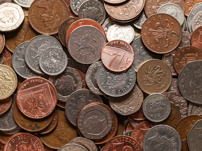 British coins spread on a surface