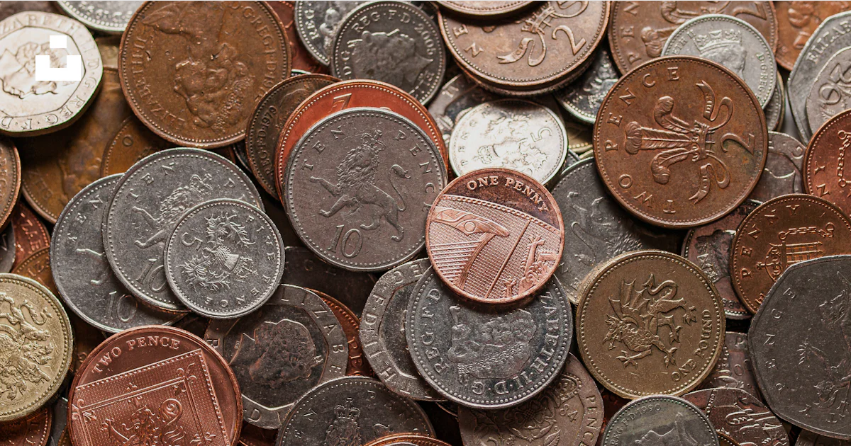 A pile of different types of coins photo – Free Money Image on Unsplash