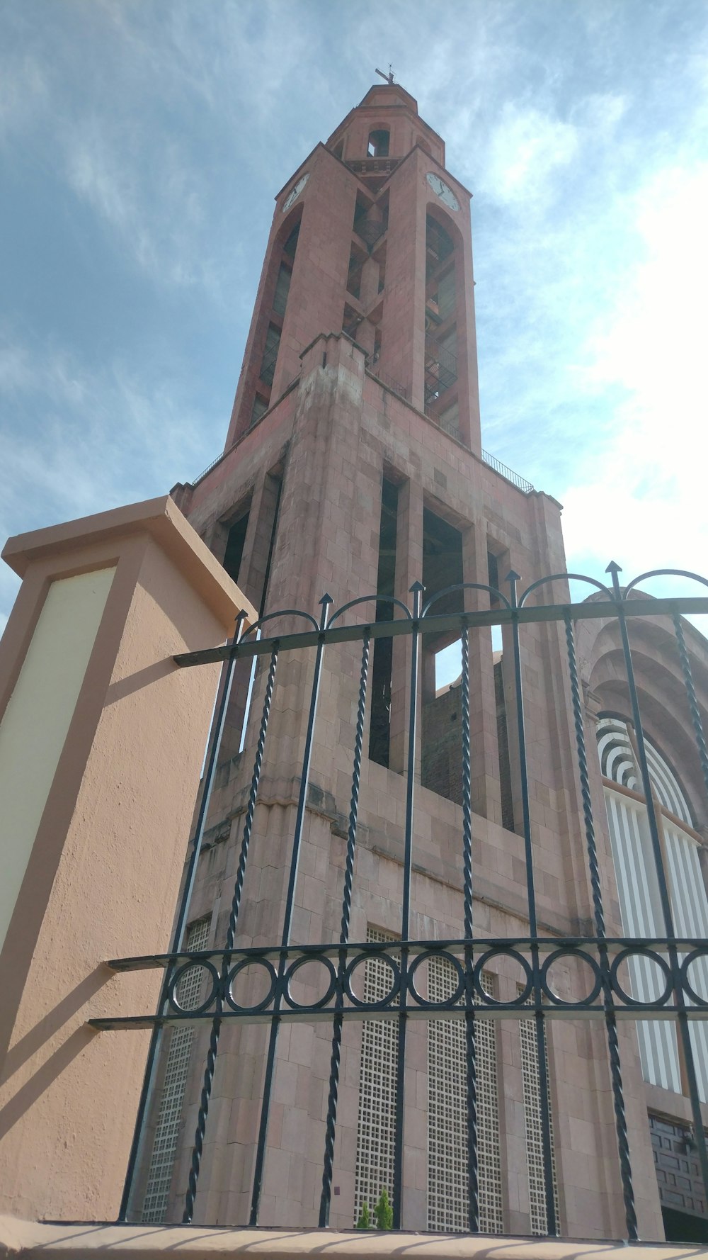 a tall tower with a clock on the top of it