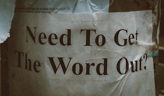 a sign that says need to get the word out
