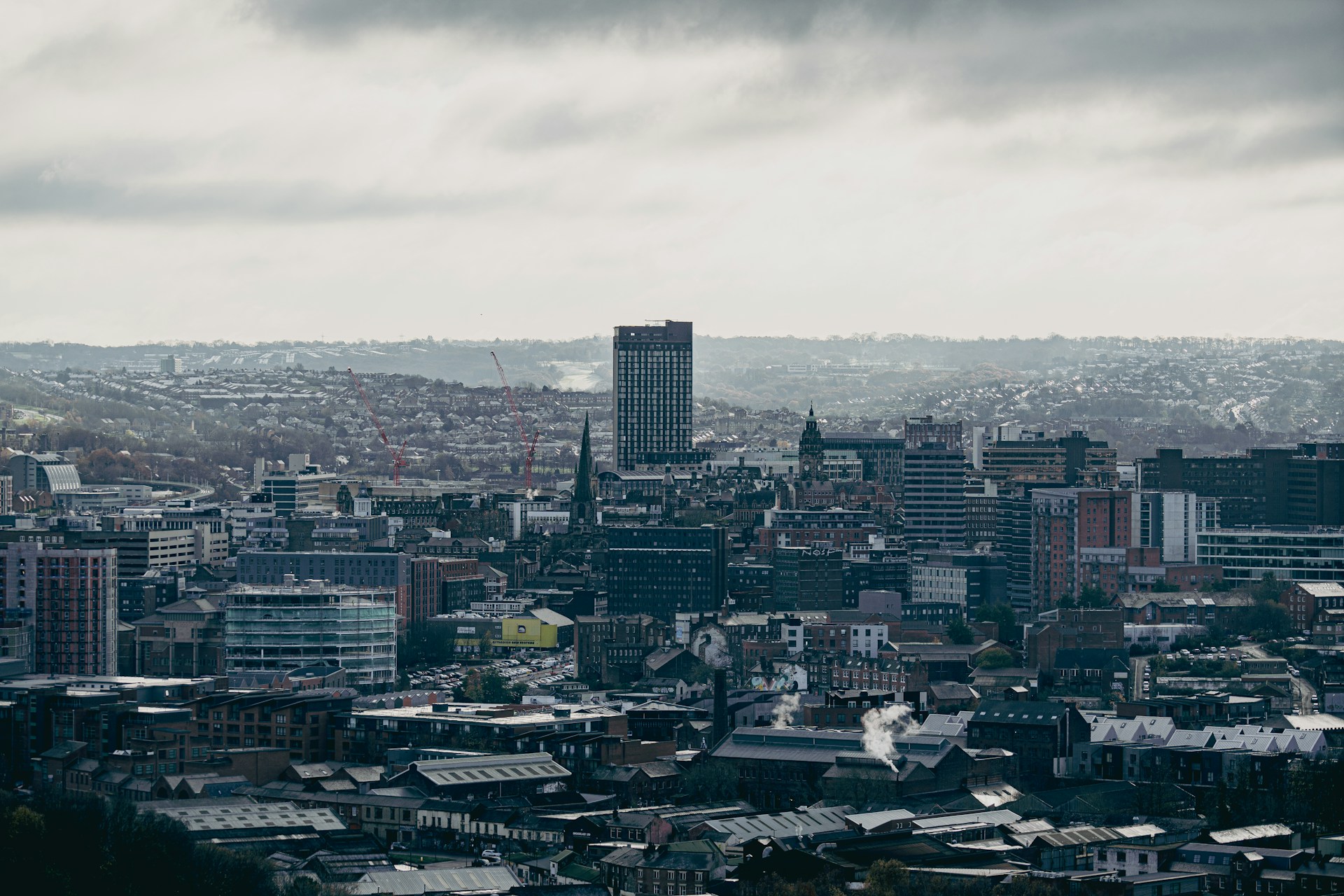 a view of a city with tall buildings