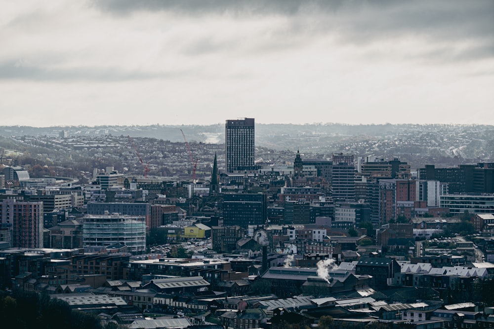 a view of a city with tall buildings