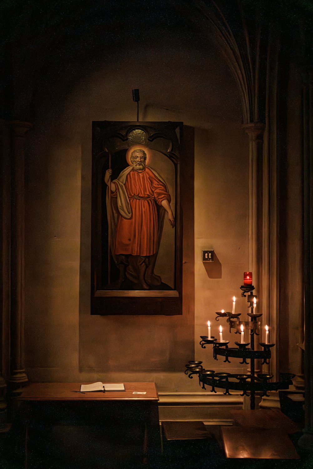 a painting of a man with a beard in a church