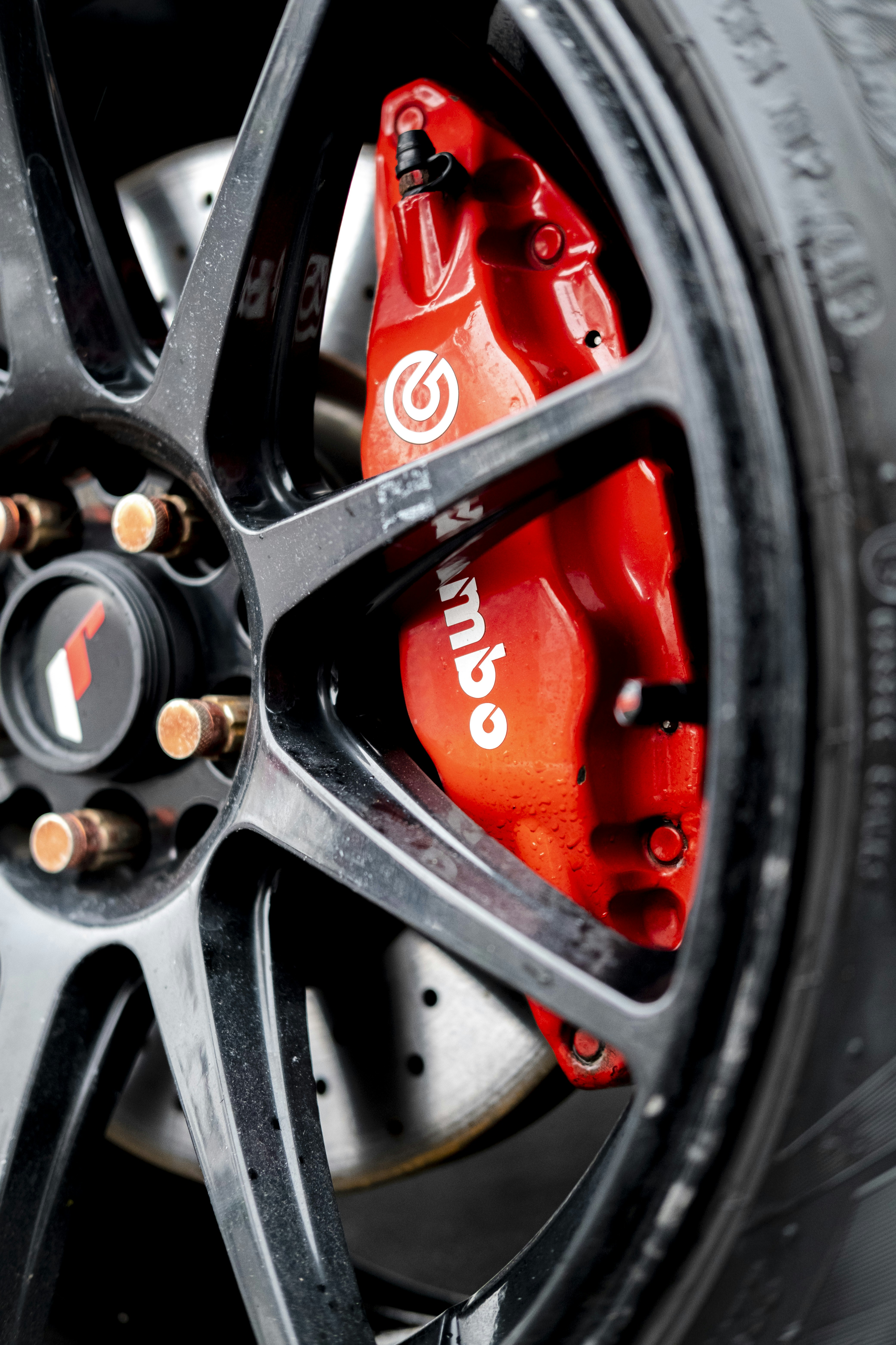 “Mechanic bleeding the brake lines to ensure safe, responsive braking performance.”