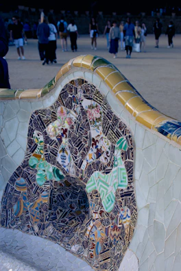 Close-up of vivatela tissue pack with bold geometric patterns on a sleek urban bench.