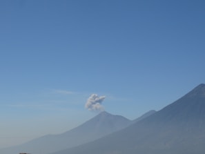 Scenic panorama of Malalcahuello’s volcanic landscapes under a clear blue sky.