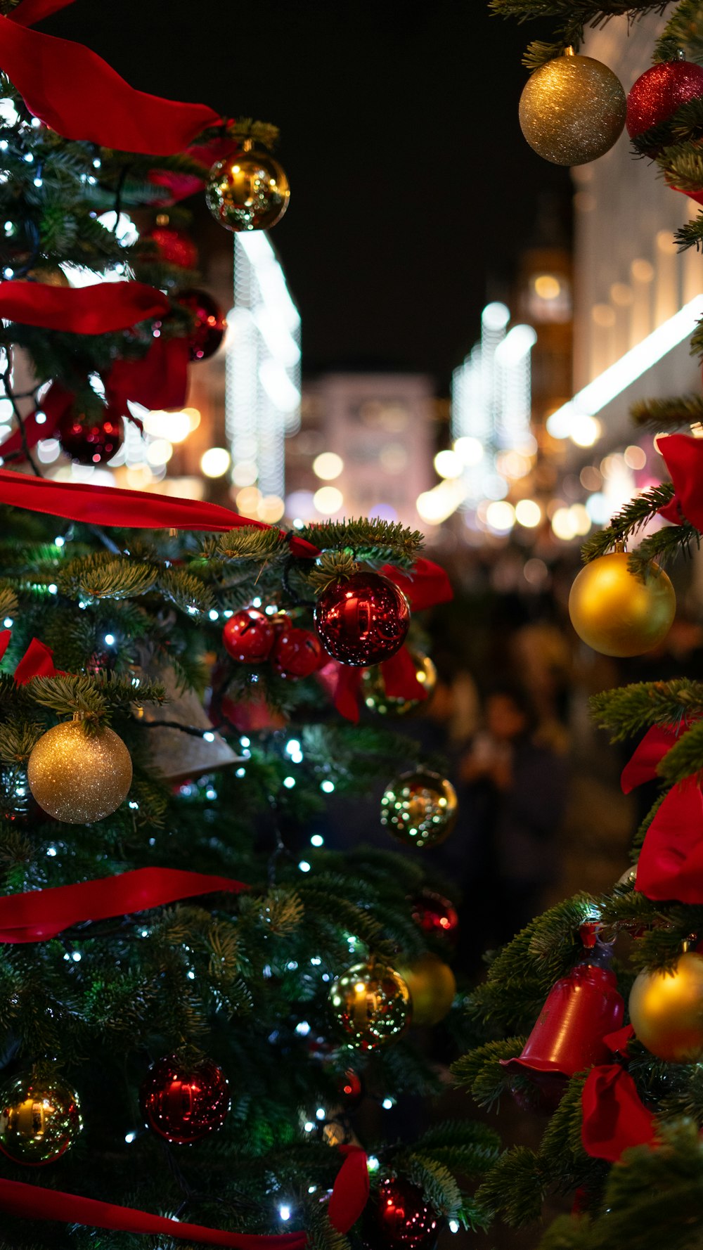 a christmas tree with red and gold ornaments