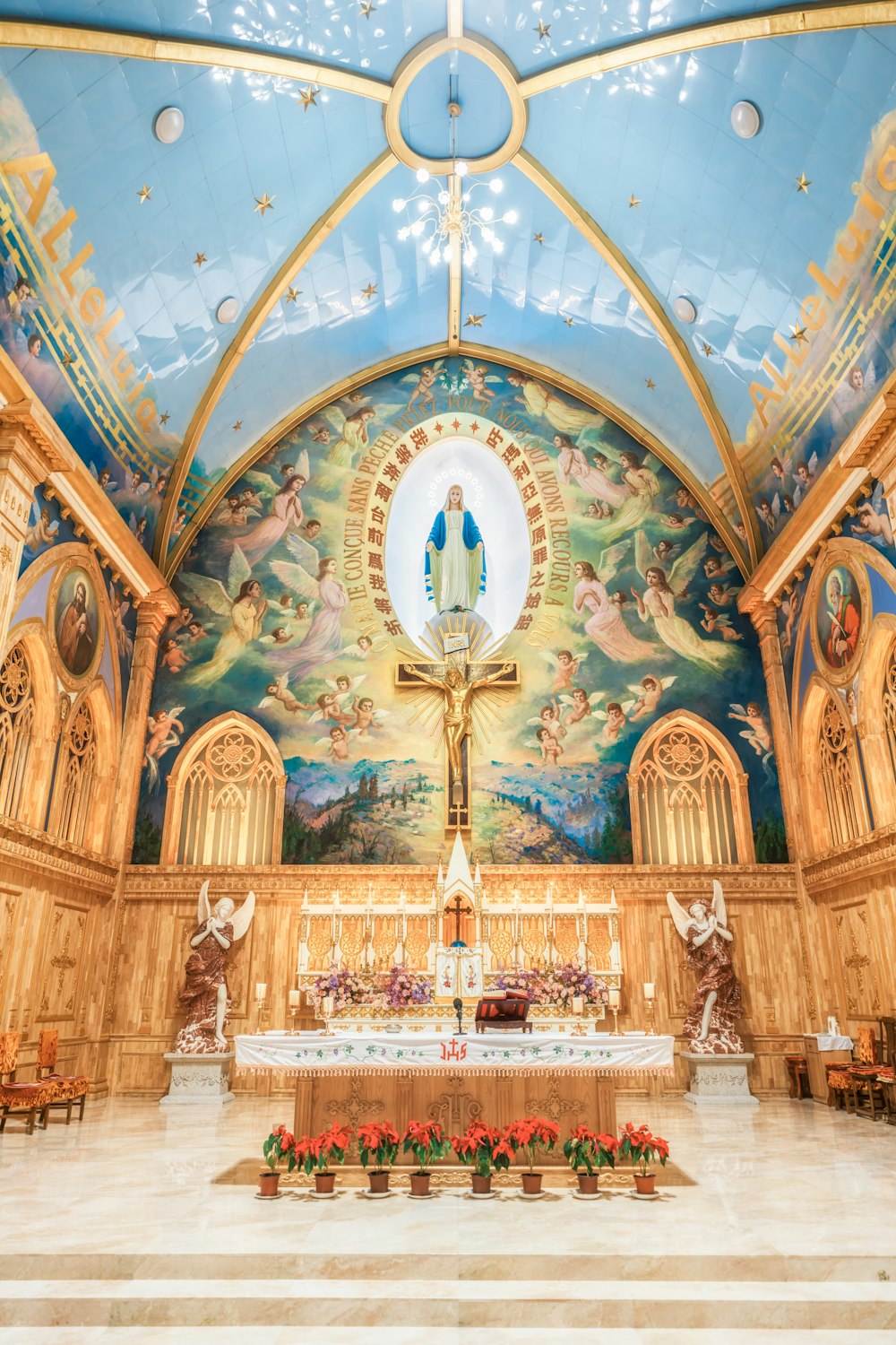 the interior of a church with a painting on the wall