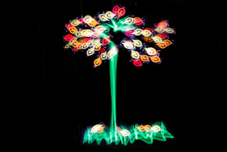 Luminous Tree of Life intertwined with DNA strands and cosmic energy in a radiant cosmic background.