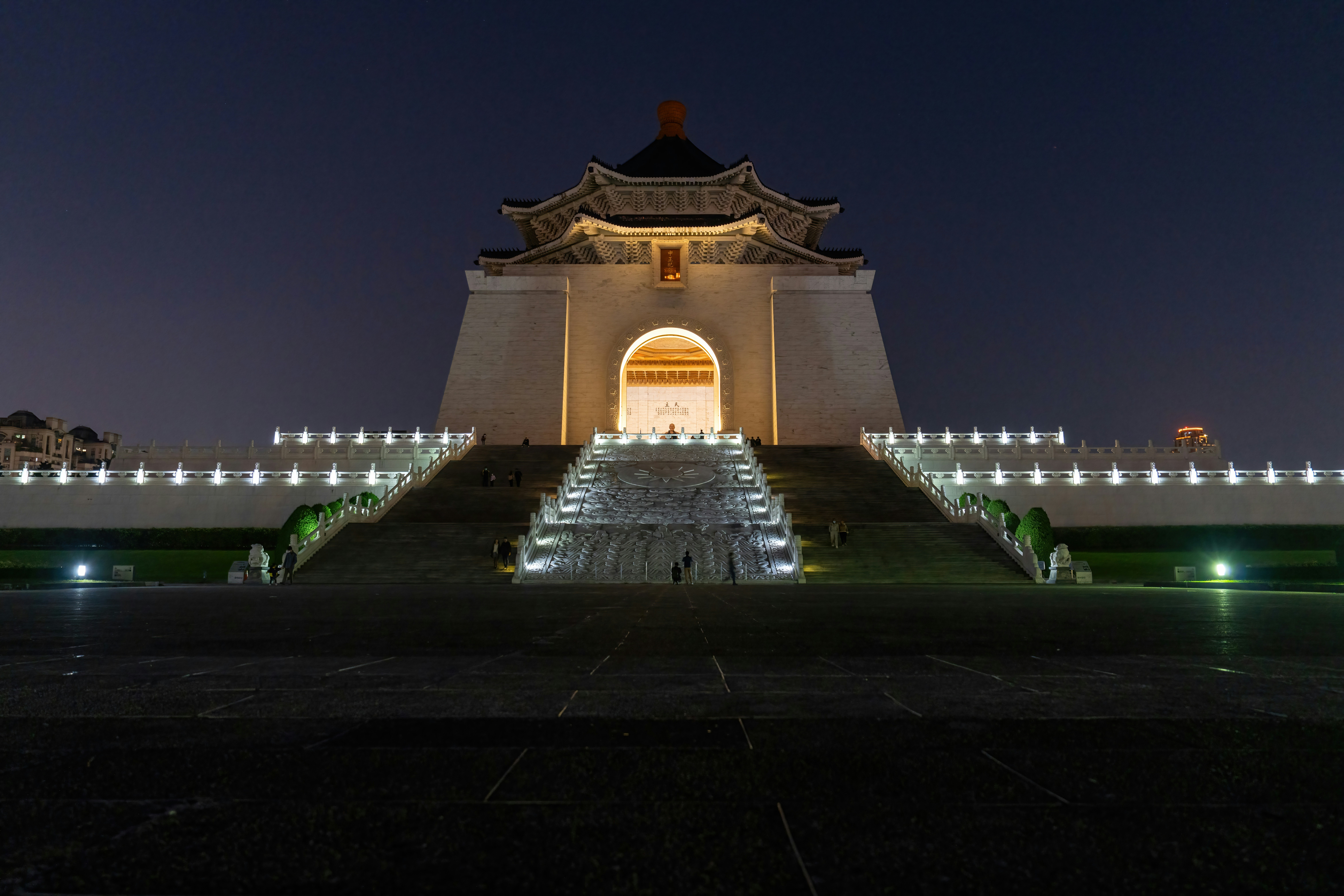 a very tall building with a clock on it's side
