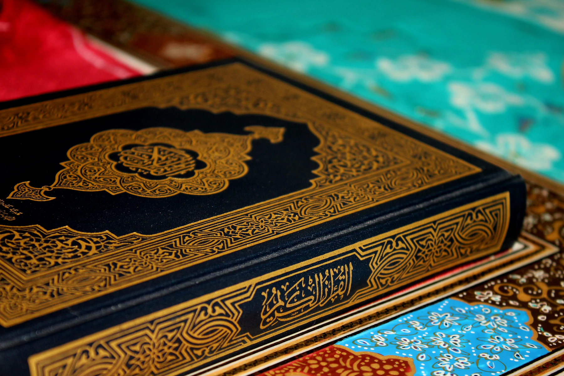 Close-up of an open Quran page