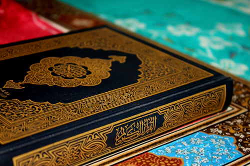 Close-up of an open Quran page for memorisation practice