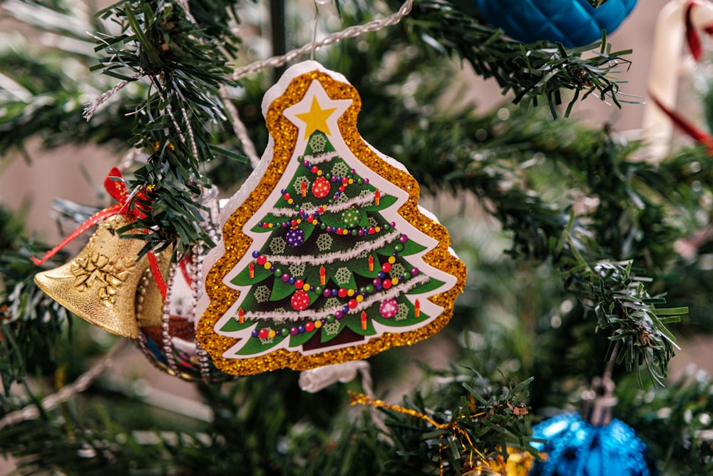 a christmas tree ornament hanging from a christmas tree
