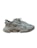 A single athletic sneaker with a chunky sole and intricate design. The shoe features a mix of synthetic materials with mesh inserts for breathability, and a lace-up closure.