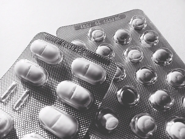 Boxes of analgesic tablets stacked ready for wholesale distribution