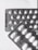 Two blister packs containing pills are placed on a light surface. The packs are arranged at slight angles to each other, with one overlapping the top left corner of the other. The lighting creates shadows that emphasize the texture of the blister packs and the shapes of the individual pill compartments.