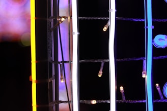 Neon blue network nodes glowing against a dark background representing threat intelligence.