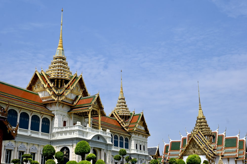 a large white building with a red roof