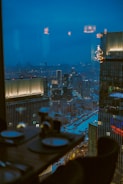 Elegant meeting room with city skyline view at dusk