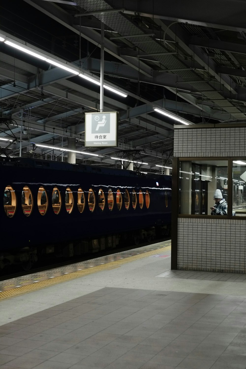 a large long train on a steel track