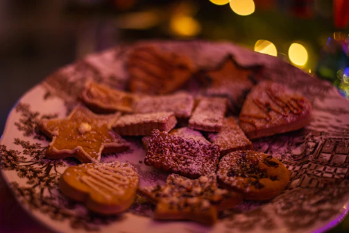 A beautifully decorated cookie platter with seasonal themes.