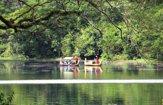 Travelers by lake Sri Lanka
