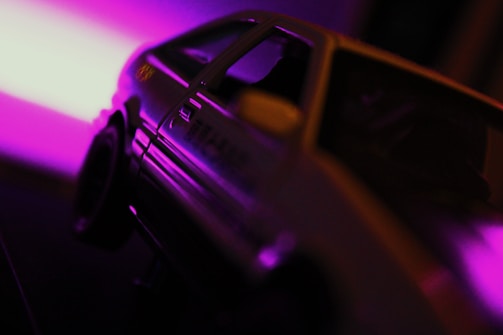 Close-up of a car with enhanced lighting and shadow effects.