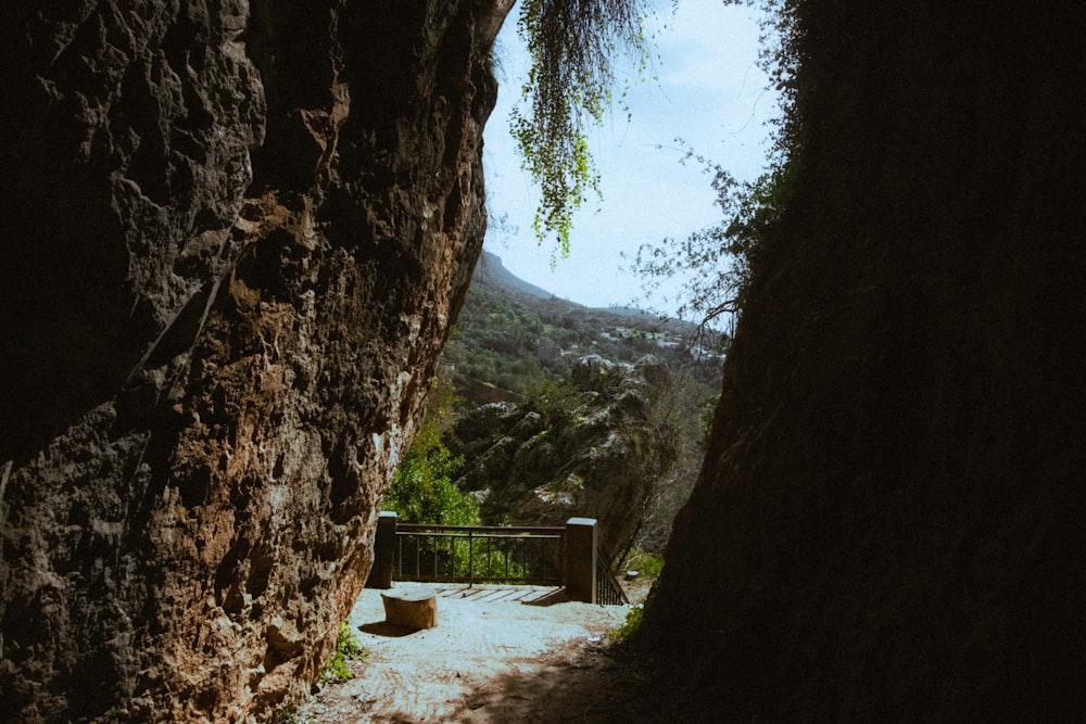 a bench sitting in the middle of a cave